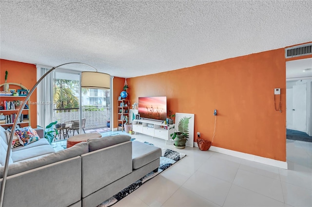 living room featuring a textured ceiling