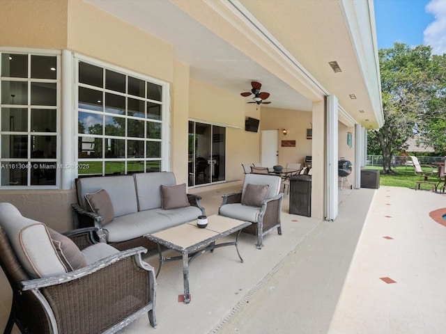 view of patio / terrace with an outdoor hangout area and ceiling fan