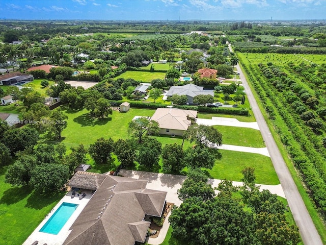 birds eye view of property featuring a rural view