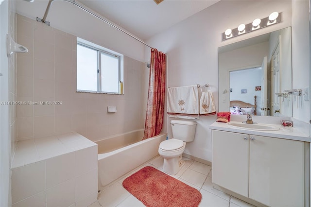 full bathroom featuring vanity, toilet, tile patterned floors, and shower / bath combo