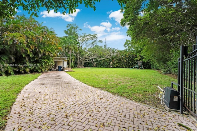 exterior space featuring a yard and a playground