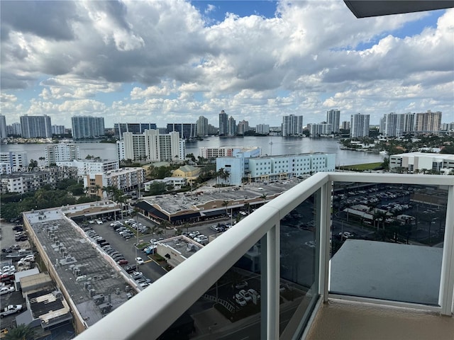 balcony featuring a water view