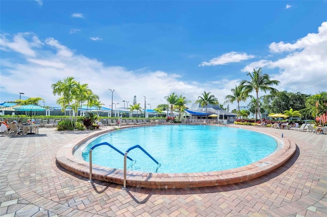 view of pool featuring a patio