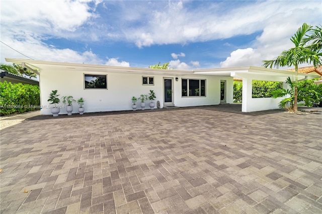 view of front of house with a patio area