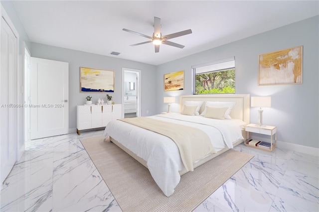 bedroom with ceiling fan and ensuite bathroom