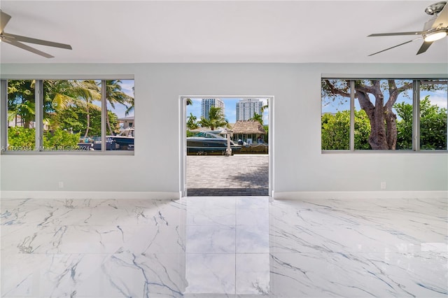 foyer with ceiling fan