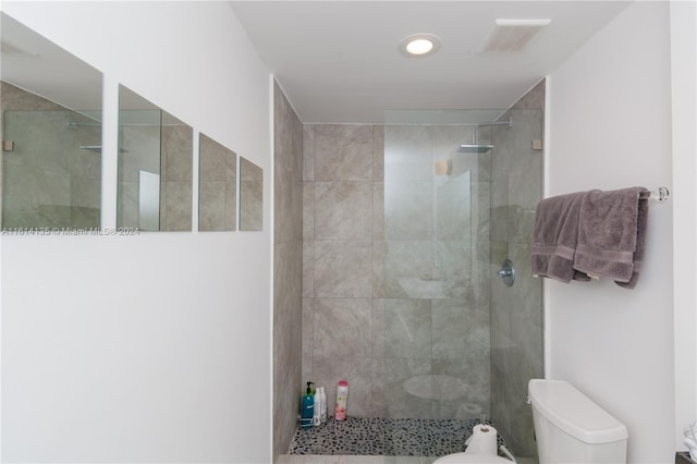 3 Island Ave Unit 04J, Miami Beach, FL 33139 - bathroom with visible vents, toilet, and walk in shower