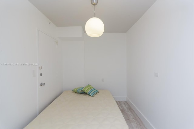 3 Island Ave Unit 04J, Miami Beach, FL 33139 - unfurnished bedroom with light wood-type flooring and baseboards