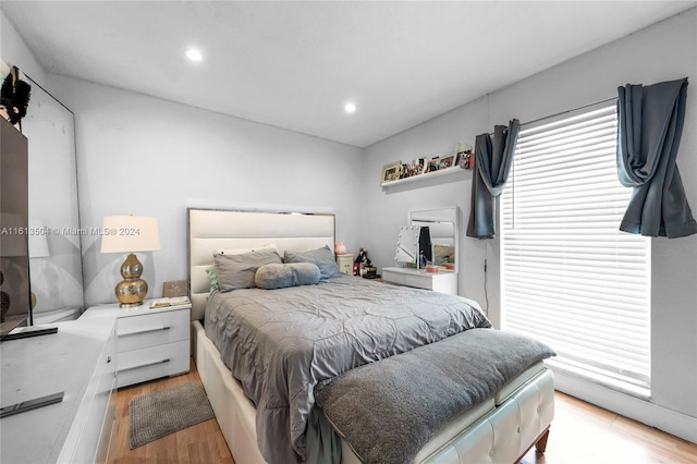 bedroom with light wood-type flooring