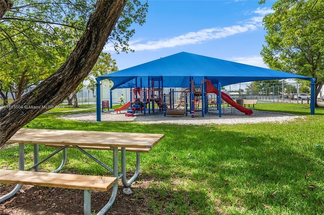 view of playground with a yard