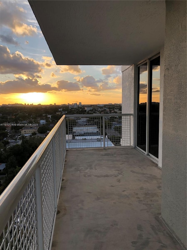 view of balcony at dusk