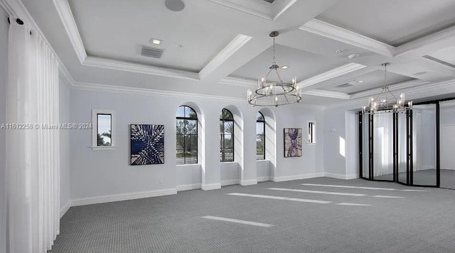 spare room featuring carpet flooring, ornamental molding, coffered ceiling, beamed ceiling, and a chandelier