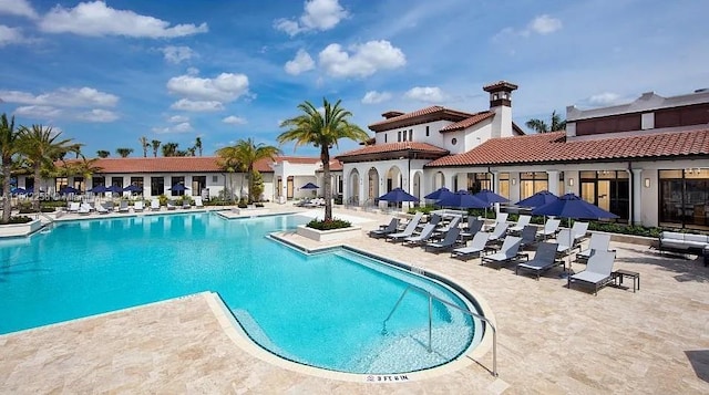 view of swimming pool featuring a patio