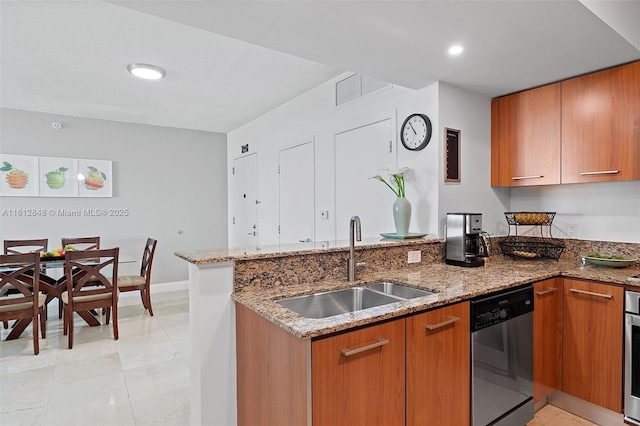 kitchen featuring sink, stainless steel appliances, light stone counters, kitchen peninsula, and light tile patterned flooring