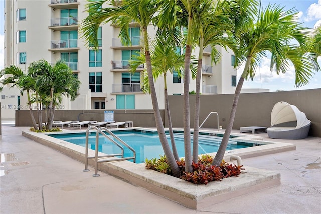 view of pool featuring a patio area