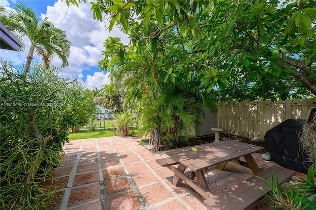 view of patio with a grill