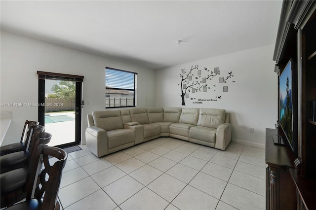 living room with light tile patterned floors