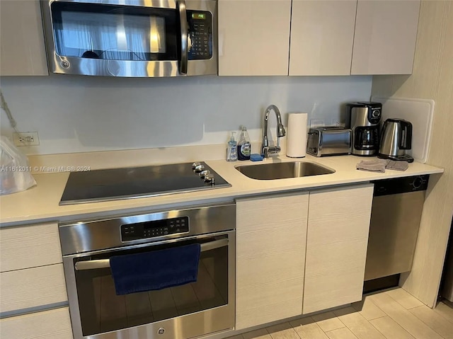 kitchen featuring appliances with stainless steel finishes and sink