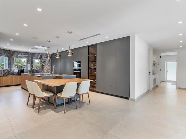 dining room featuring sink