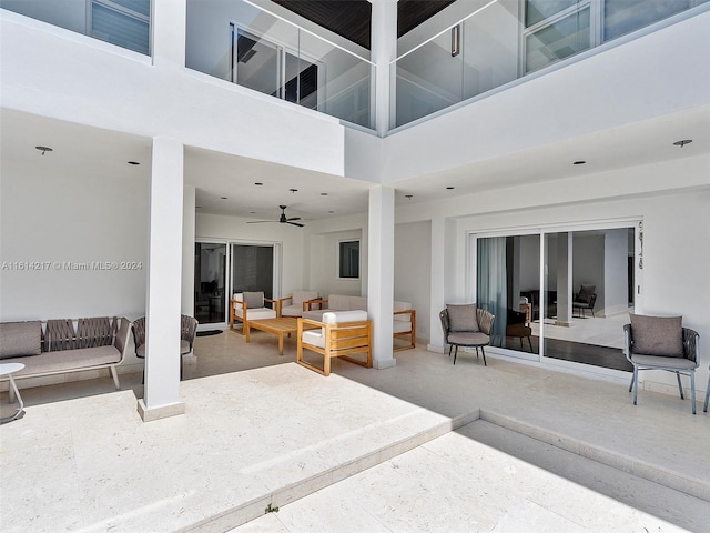 view of patio featuring outdoor lounge area and ceiling fan