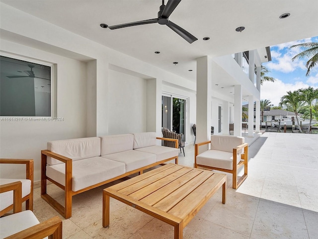 view of patio featuring ceiling fan and an outdoor living space