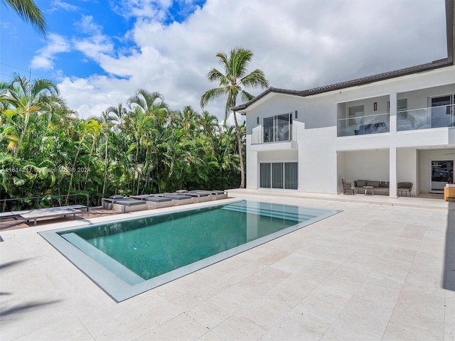 view of pool with a patio area