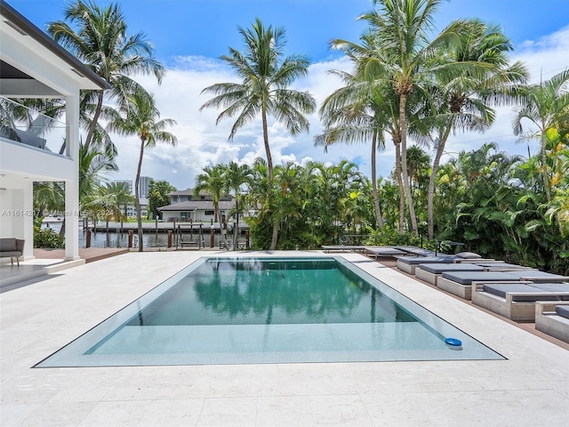 view of pool featuring a patio area