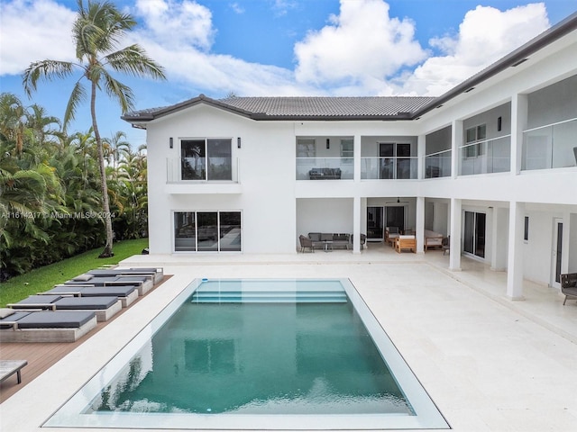 view of swimming pool with an outdoor hangout area and a patio area