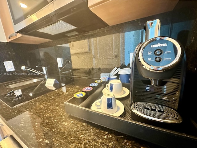 room details with a sink and tasteful backsplash