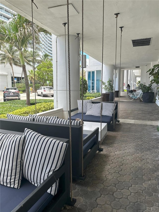 view of patio / terrace with visible vents and an outdoor hangout area