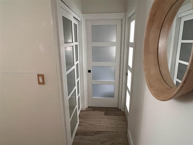 doorway to outside with hardwood / wood-style floors