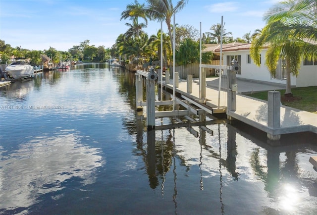 dock area featuring a water view