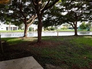 view of yard with a water view