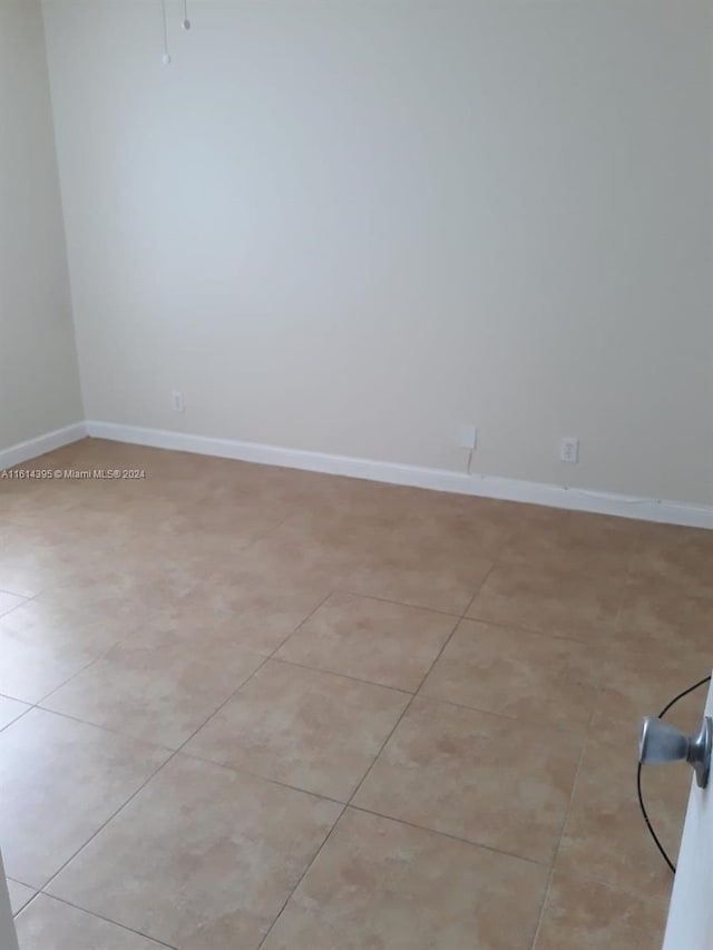 view of tiled empty room