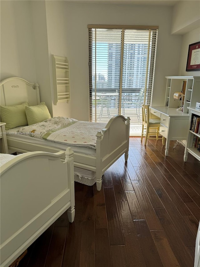 bedroom featuring dark wood-style floors