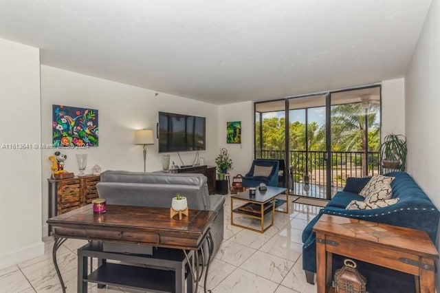 living room with floor to ceiling windows