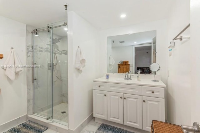 bathroom with vanity and walk in shower