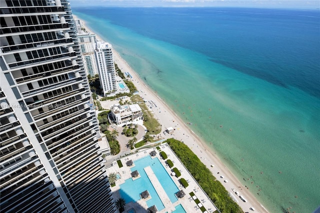 aerial view featuring a beach view and a water view