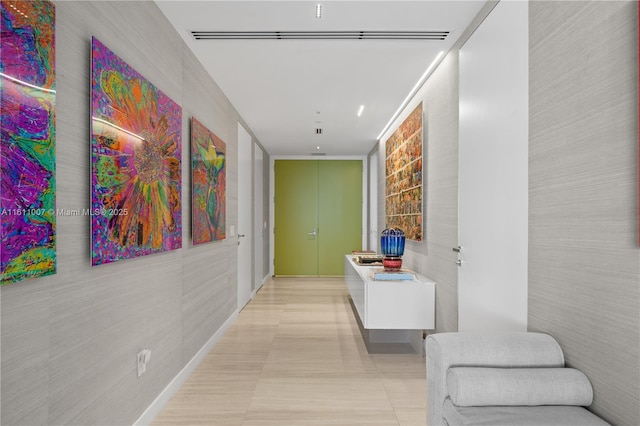 corridor featuring light tile patterned floors