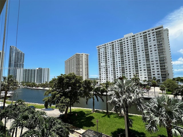 view of building exterior with a water view