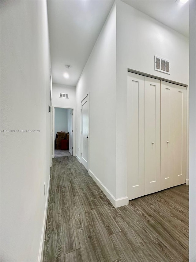 hallway featuring dark hardwood / wood-style floors