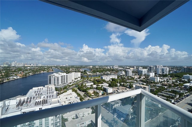 balcony featuring a water view