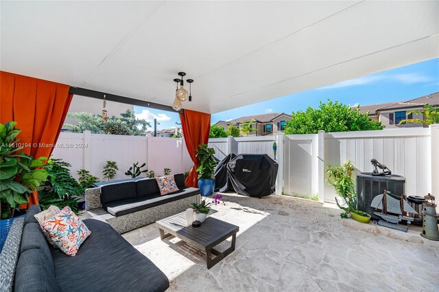 view of patio featuring central AC and an outdoor hangout area