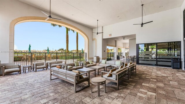 view of patio featuring ceiling fan and an outdoor hangout area