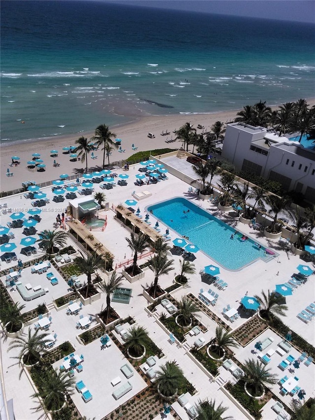 aerial view featuring a water view and a beach view