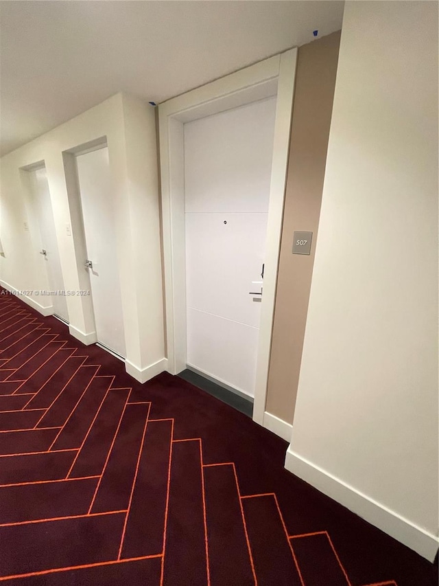 interior space with dark wood-type flooring