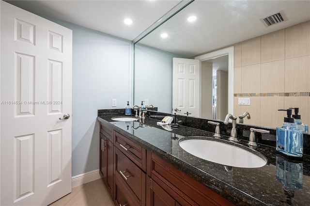 bathroom featuring vanity and tile patterned floors