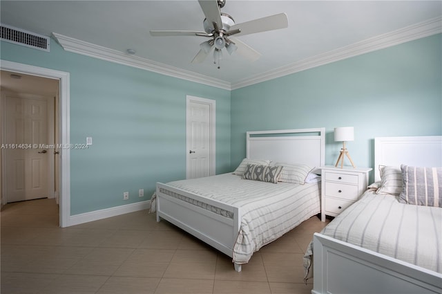 bedroom with ceiling fan and crown molding