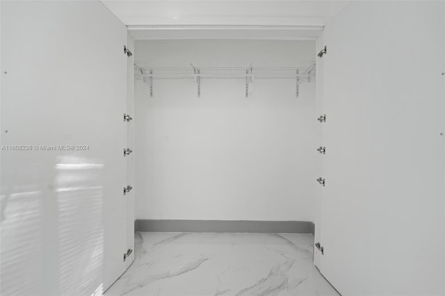 walk in closet featuring tile patterned floors