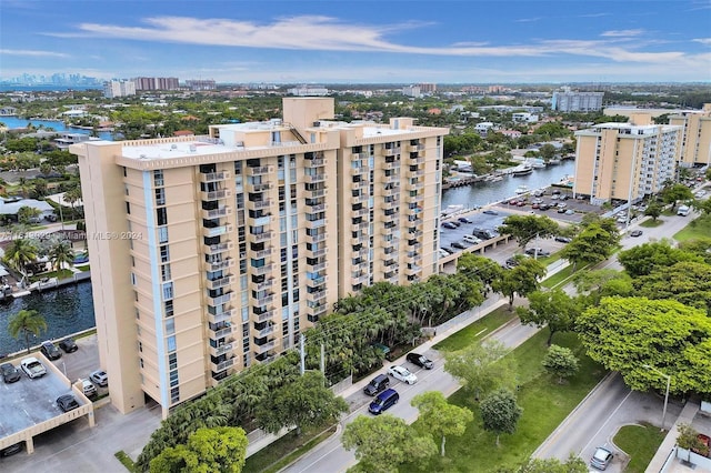 birds eye view of property featuring a water view